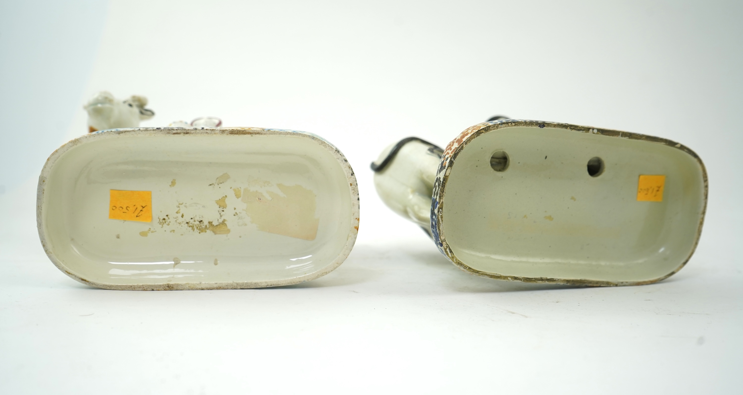 Two Yorkshire Prattware cows, with farmer or milkmaid and dog groups, c.1810